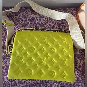 Louis Vuitton Bright Yellow Embossed Coussin bag never used